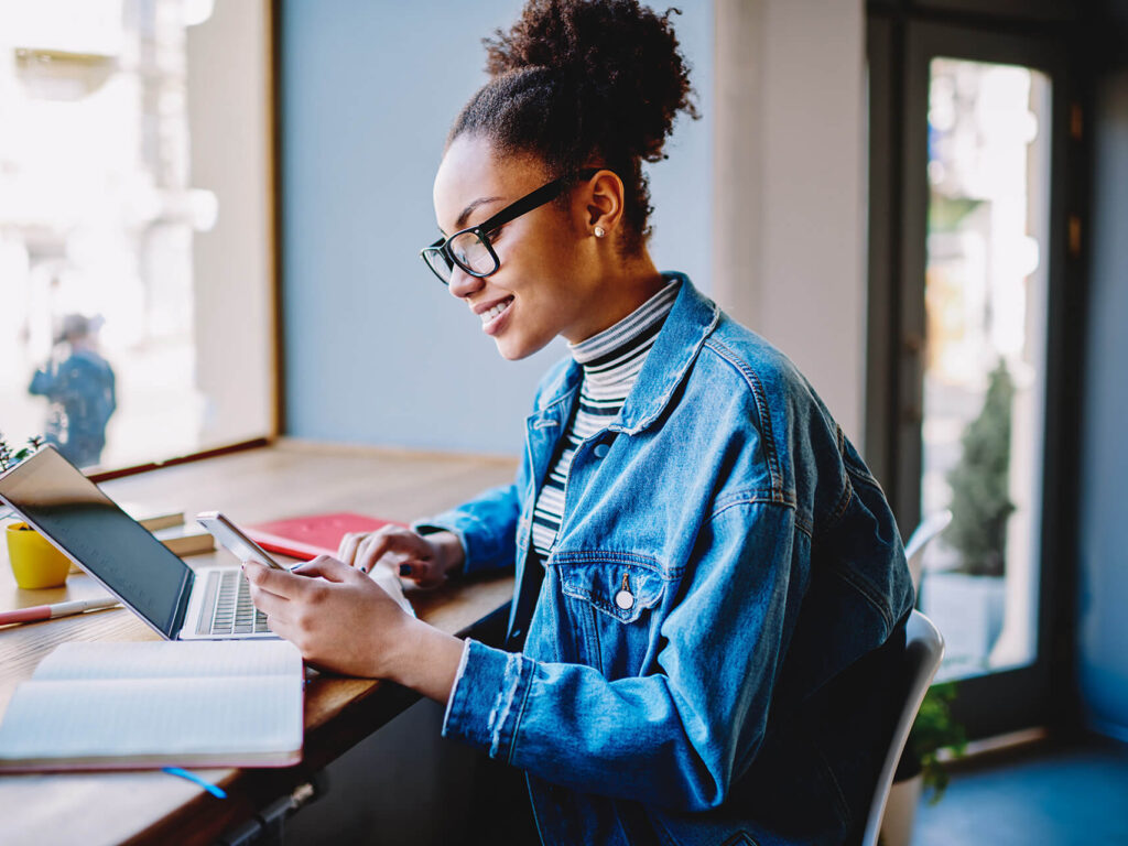 woman utilizing quaint oak bank's digital banking services for her commercial bank account