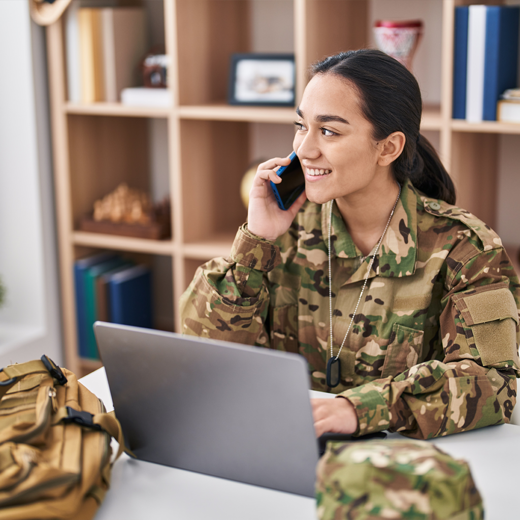 Woman in military uniform applies for a military checking account over the phone