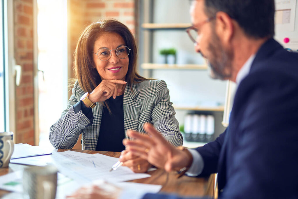 business professionals discussing corporate banking solutions