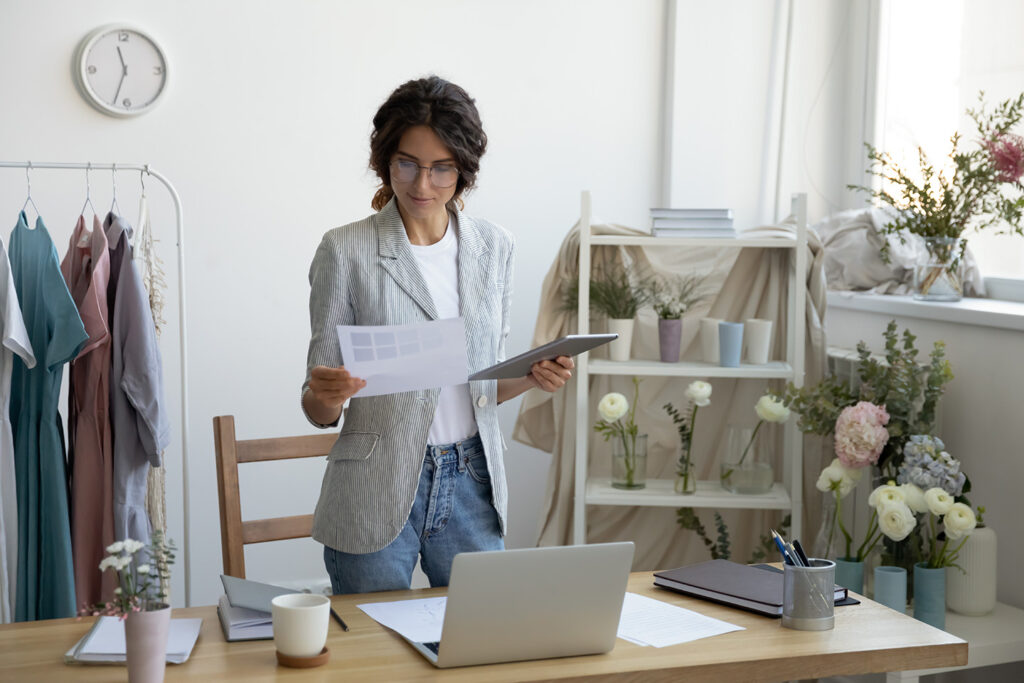 Woman analyzing business data to open up a commercial term loan