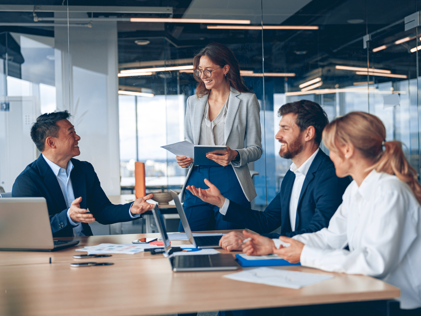 a legal team reviews their business plan as they prepare to find an SBA loan for law firms and finance their growth
