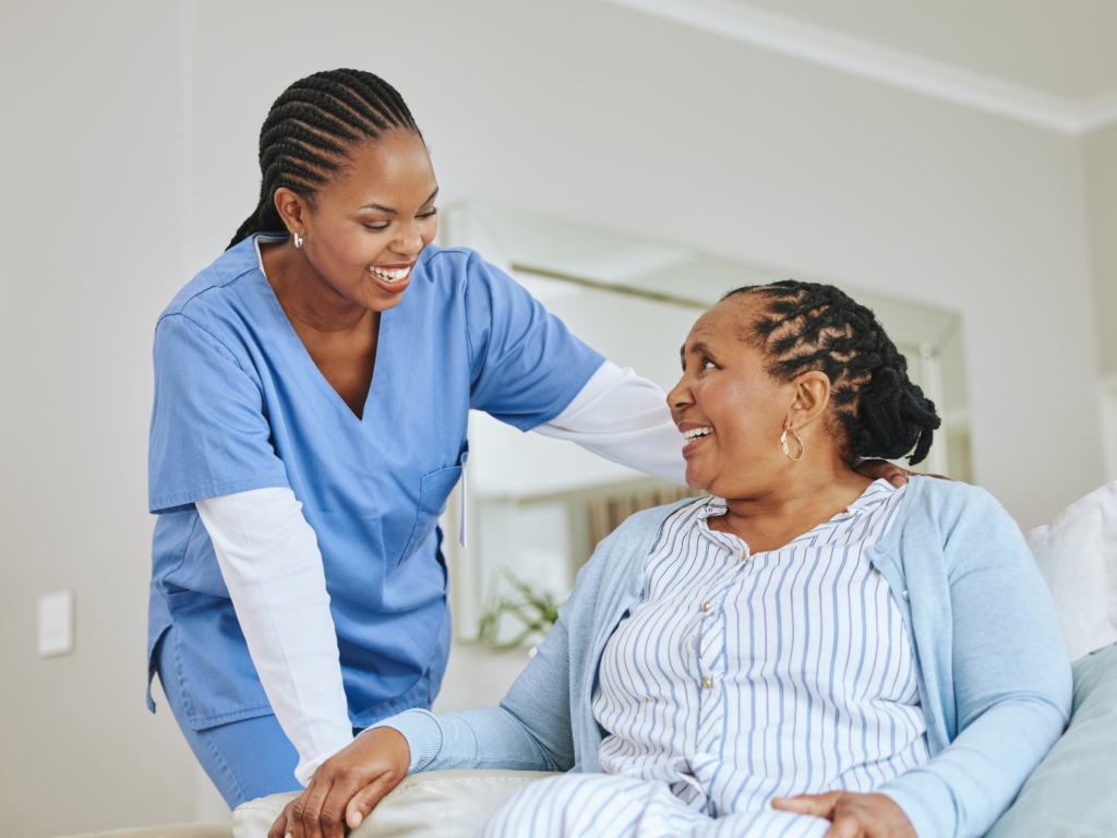 a female owner discussing with her patient the steps she made after learning more about growth for your home healthcare business to find financing to better serve their needs
