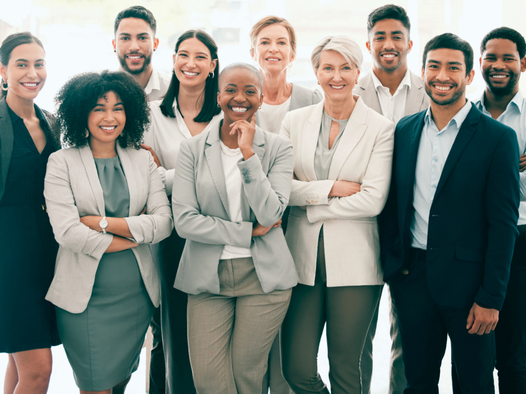 a team of coworkers who work for a local bank after meeting about the benefits of opening a checking account with a community bank