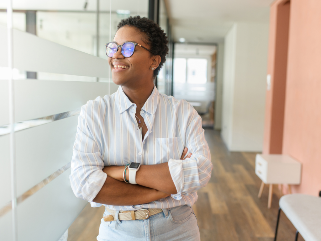 an owner of a wellness franchise considers their lending options after learning more about SBA loan options for LGBTQ+ business owners
