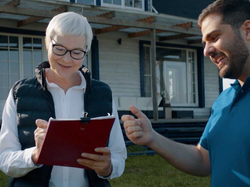 SBA Loans for Plumbers: A Steady Way to Navigate Slow Seasons Without Stress 2 an owner of a plumbing business writes up a work order for her client for a job she expanded using sba loans for plumbers