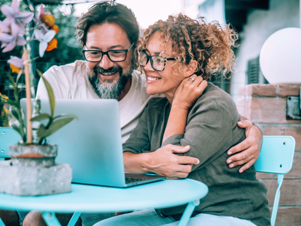 a couple reviewing certificate of deposit options with quaint oak bank