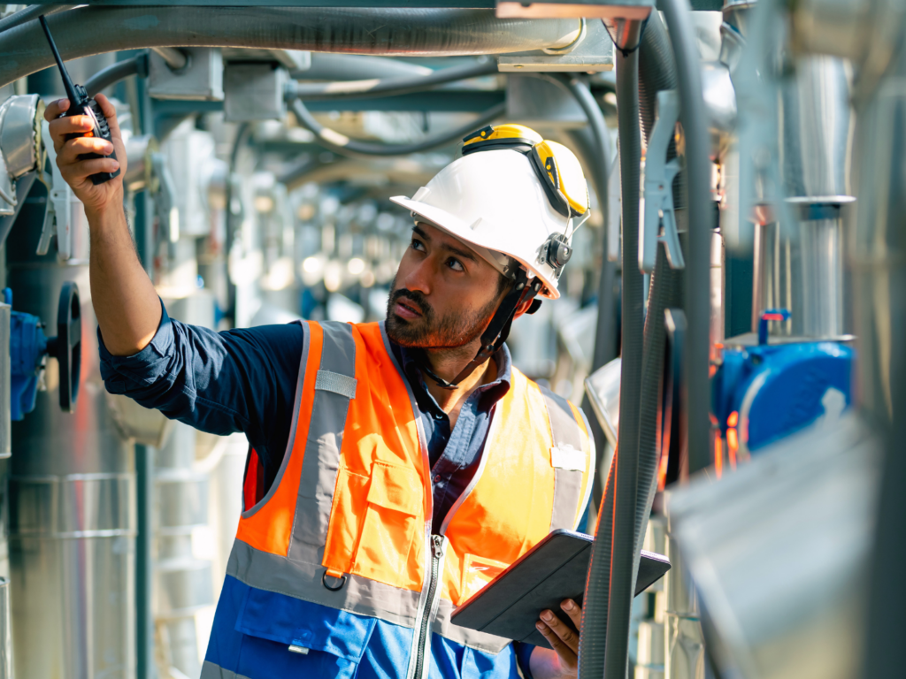 SBA Loans for HVAC Contractors: How to Fund Growth Without Straining Cash Flow 2 an owner of a hvac company on the job working with new equipment purchased with an sba loan for hvac contractors