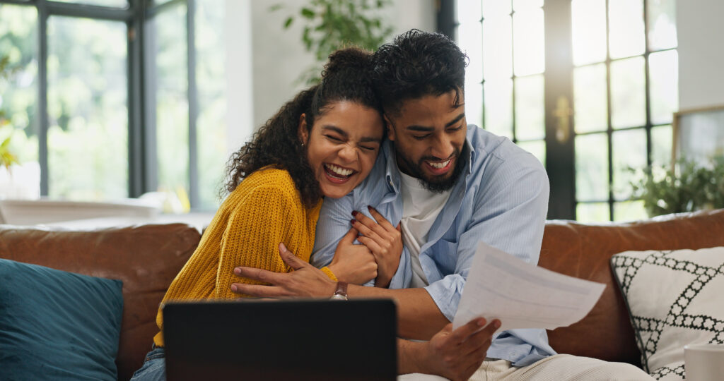 a couple reviewing certificate of deposit options with quaint oak bank